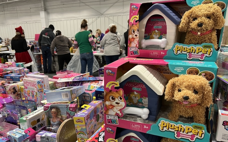 Families pick out toys during 2024 Holiday Toy Distribution.